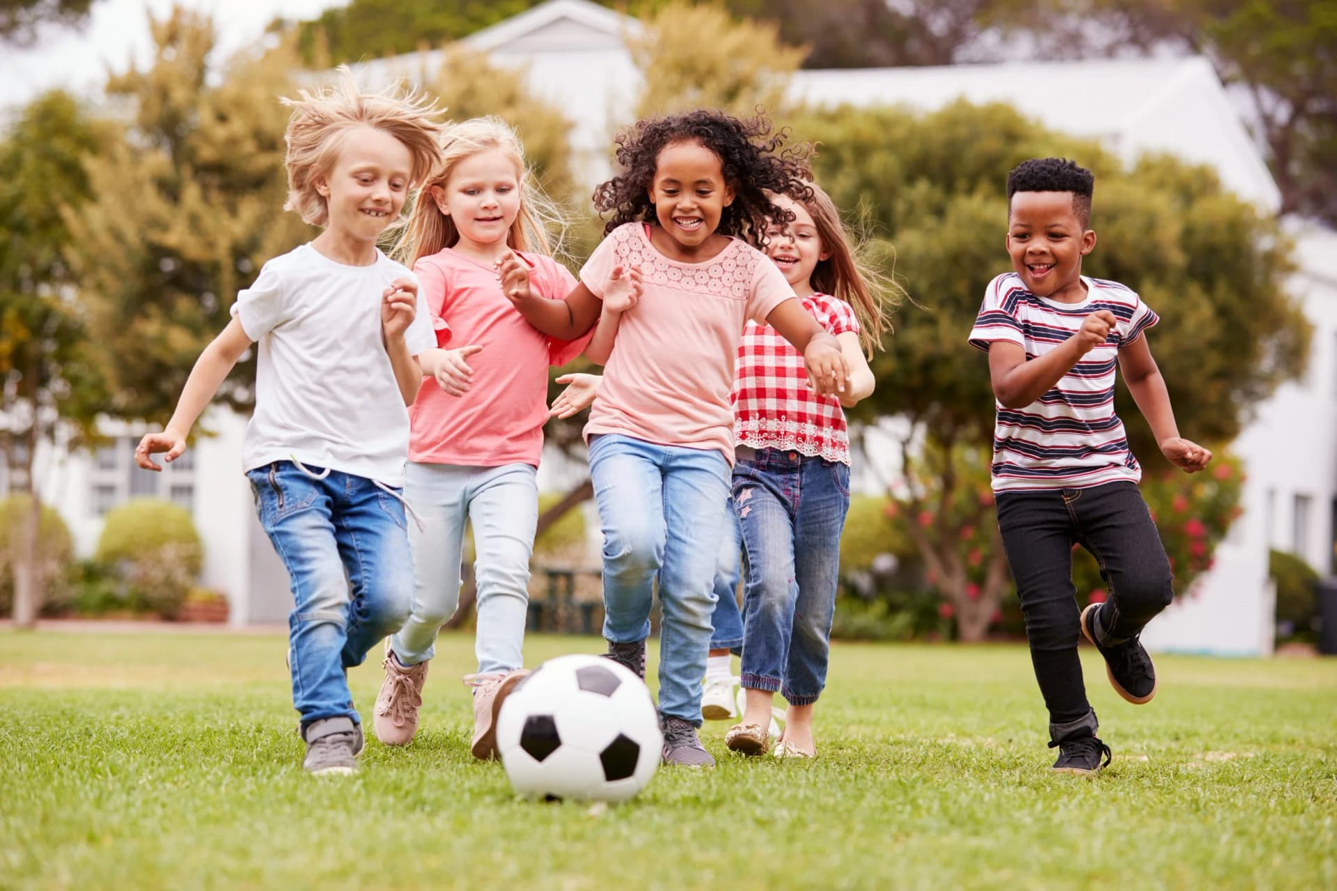 Children playing actively outdoors